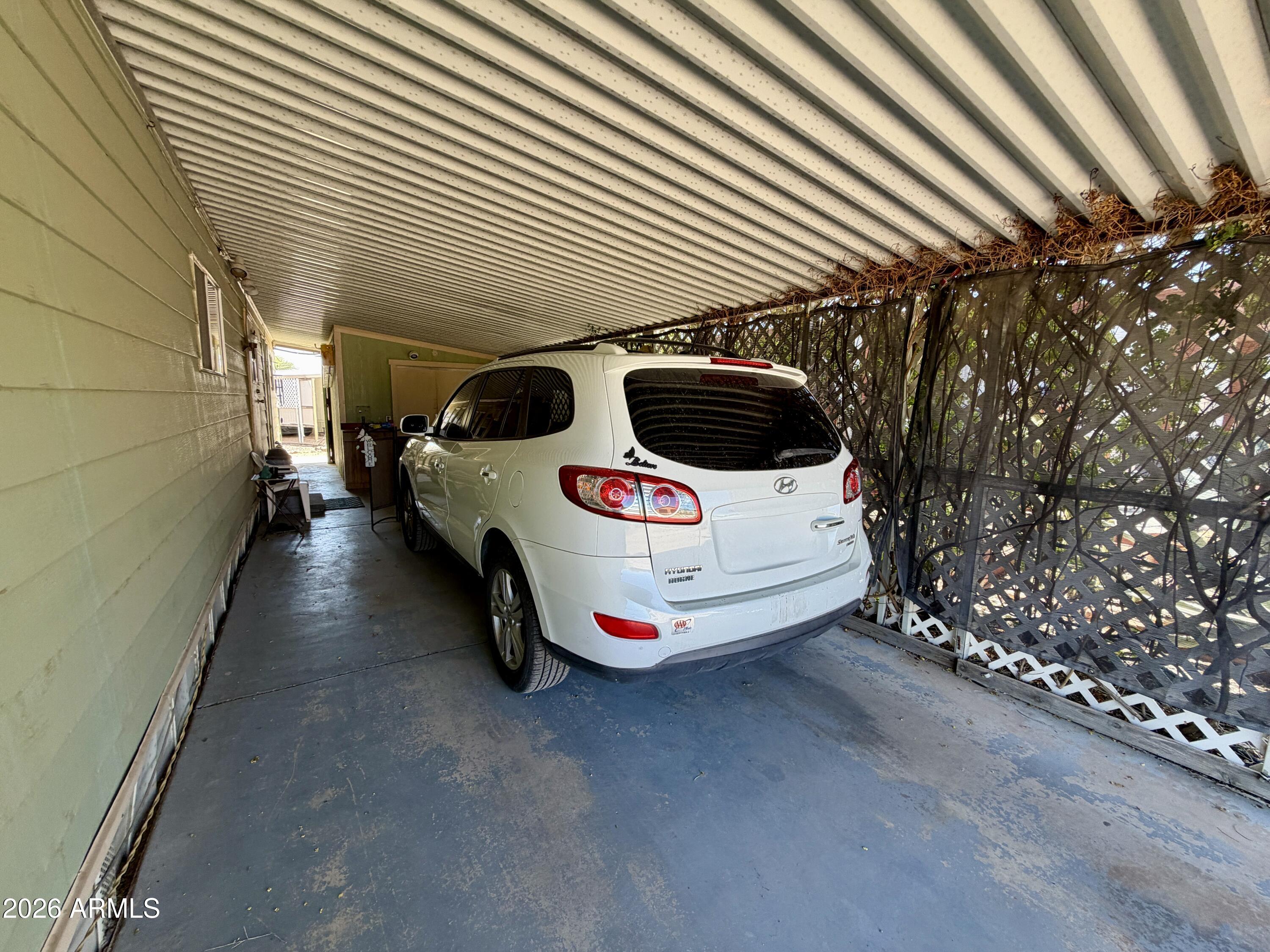 939 North Acacia Road, Unit 9 Apache Junction, AZ 85119 - Photo 5 of 36 Carport