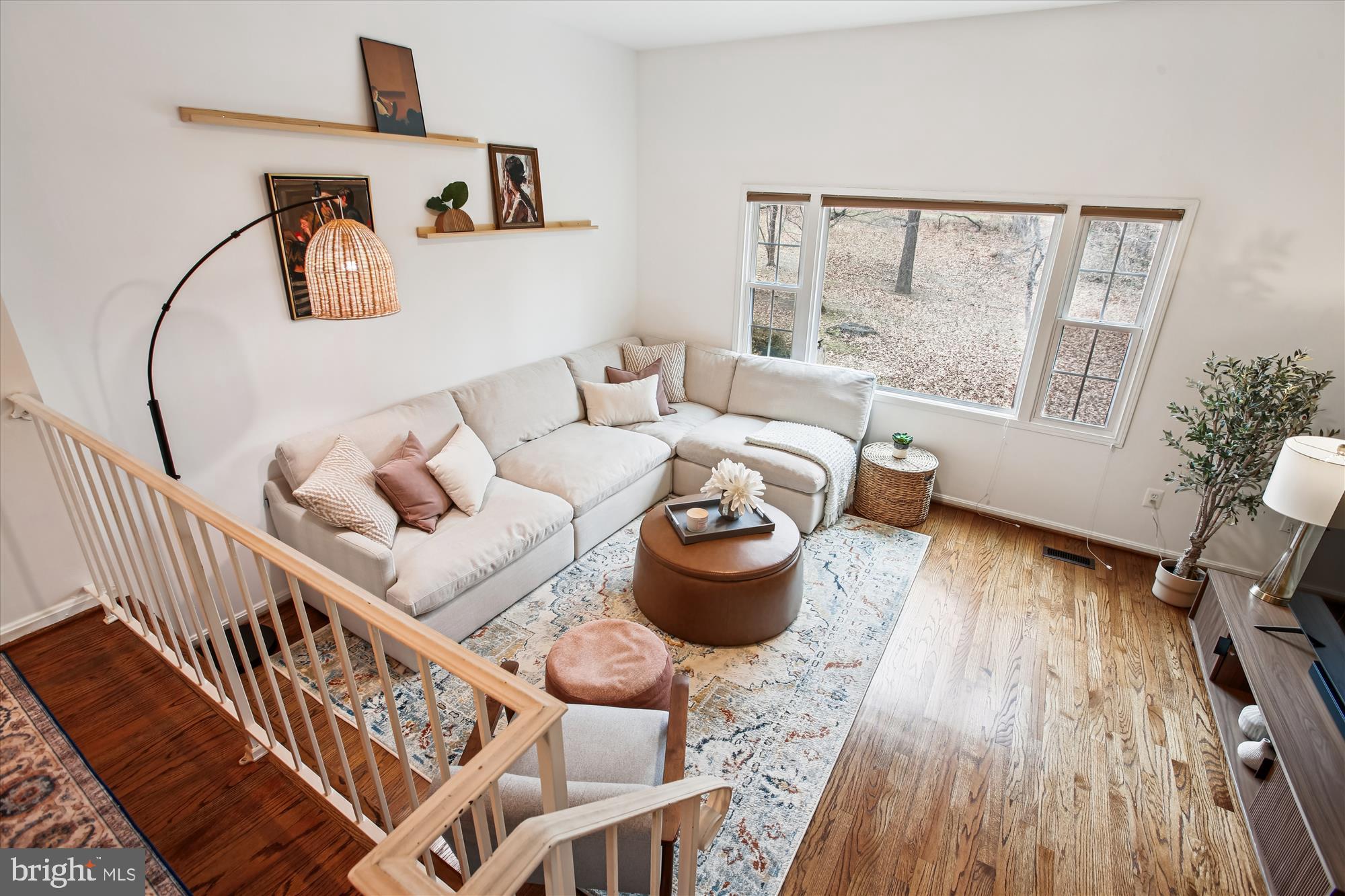 5818 Torington Drive, Unit 859 Springfield, VA 22152 - Photo 10 of 46 a living room with furniture and wooden floor