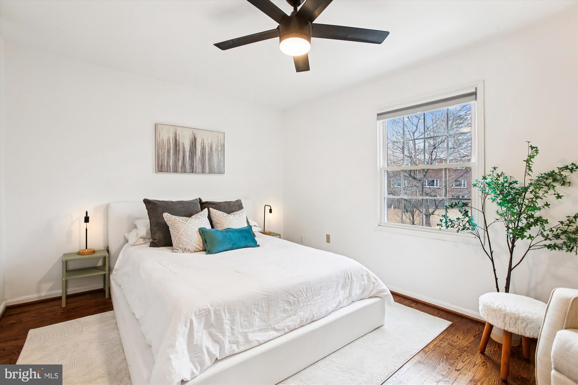 5818 Torington Drive, Unit 859 Springfield, VA 22152 - Photo 17 of 46 a bedroom with a bed and a window