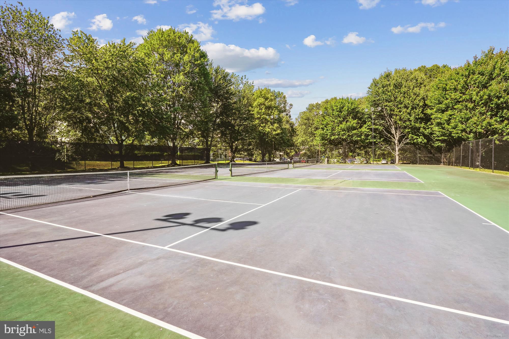 5818 Torington Drive, Unit 859 Springfield, VA 22152 - Photo 41 of 46 a view of an outdoor space and tennis court