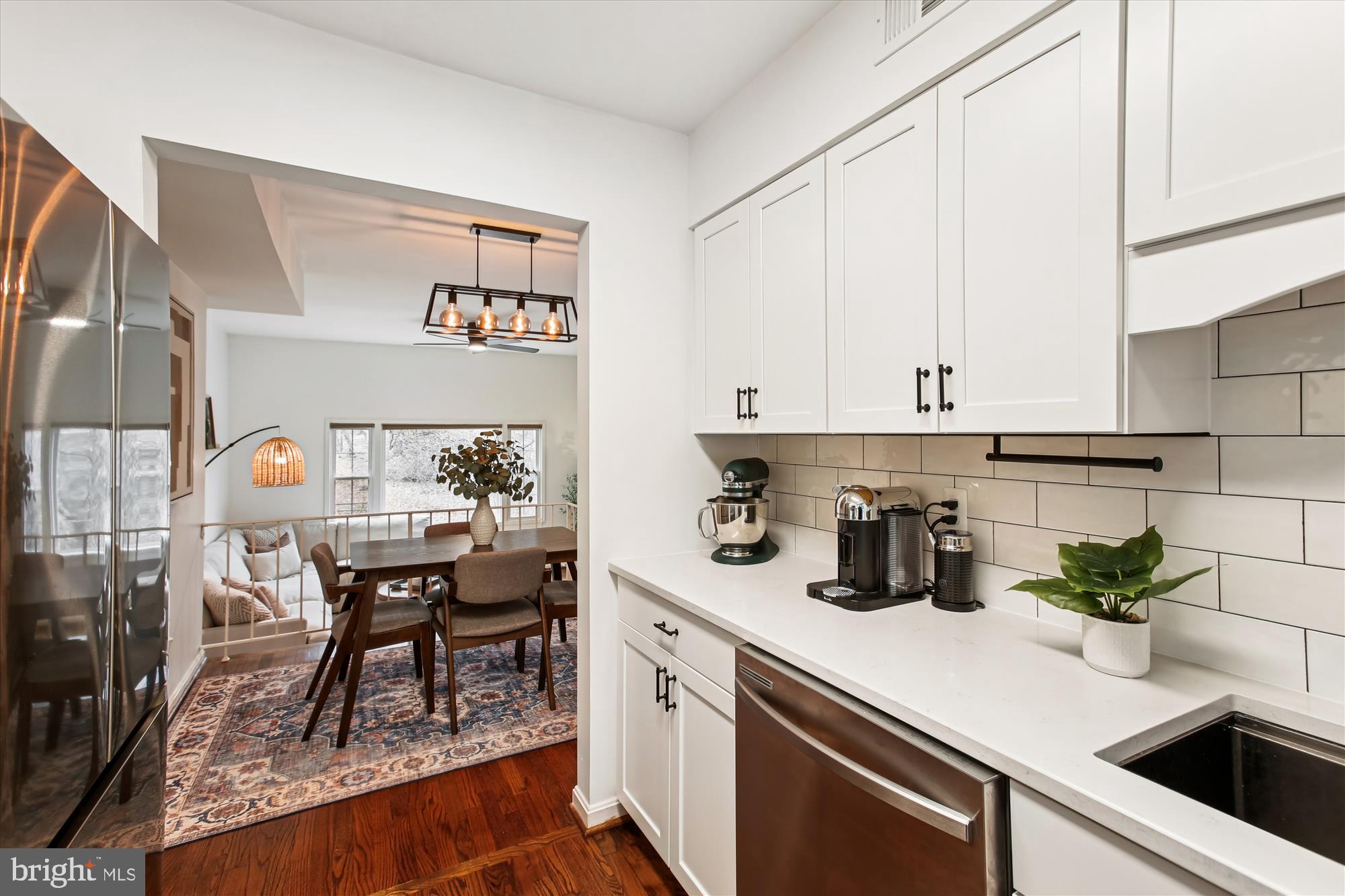 5818 Torington Drive, Unit 859 Springfield, VA 22152 - Photo 8 of 46 a kitchen with a sink and cabinets