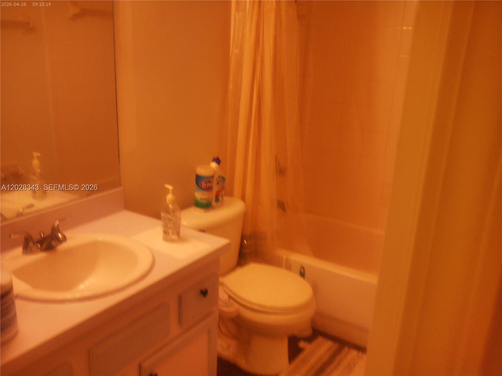 1641 Spring Oaks Lane Jacksonville, FL 32221 - Photo 10 of 44 a bathroom with a toilet a sink and shower