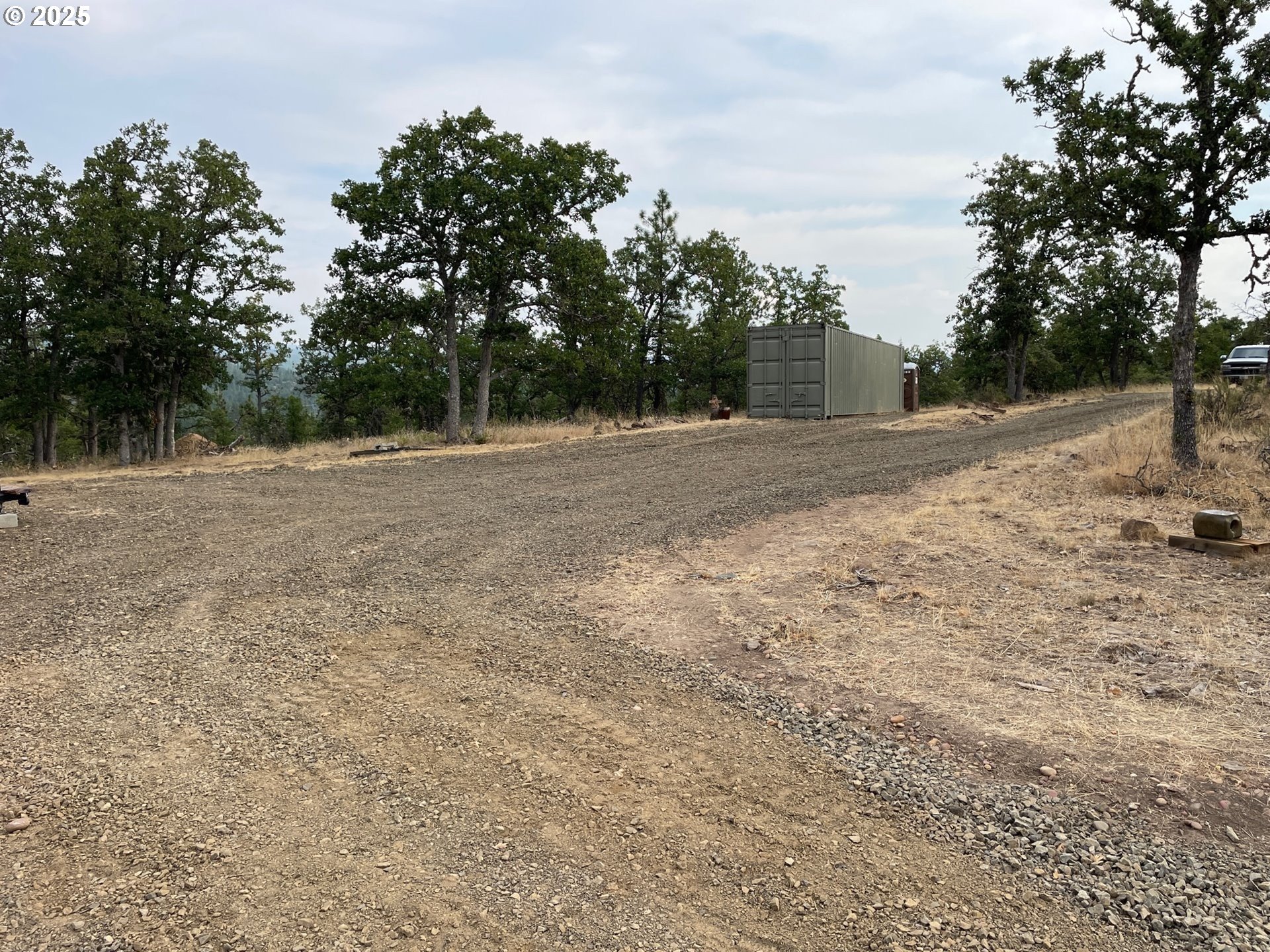 104 Jenkins Creek Road Goldendale, WA 98620 - Photo 15 of 45 a backyard of a house with trees