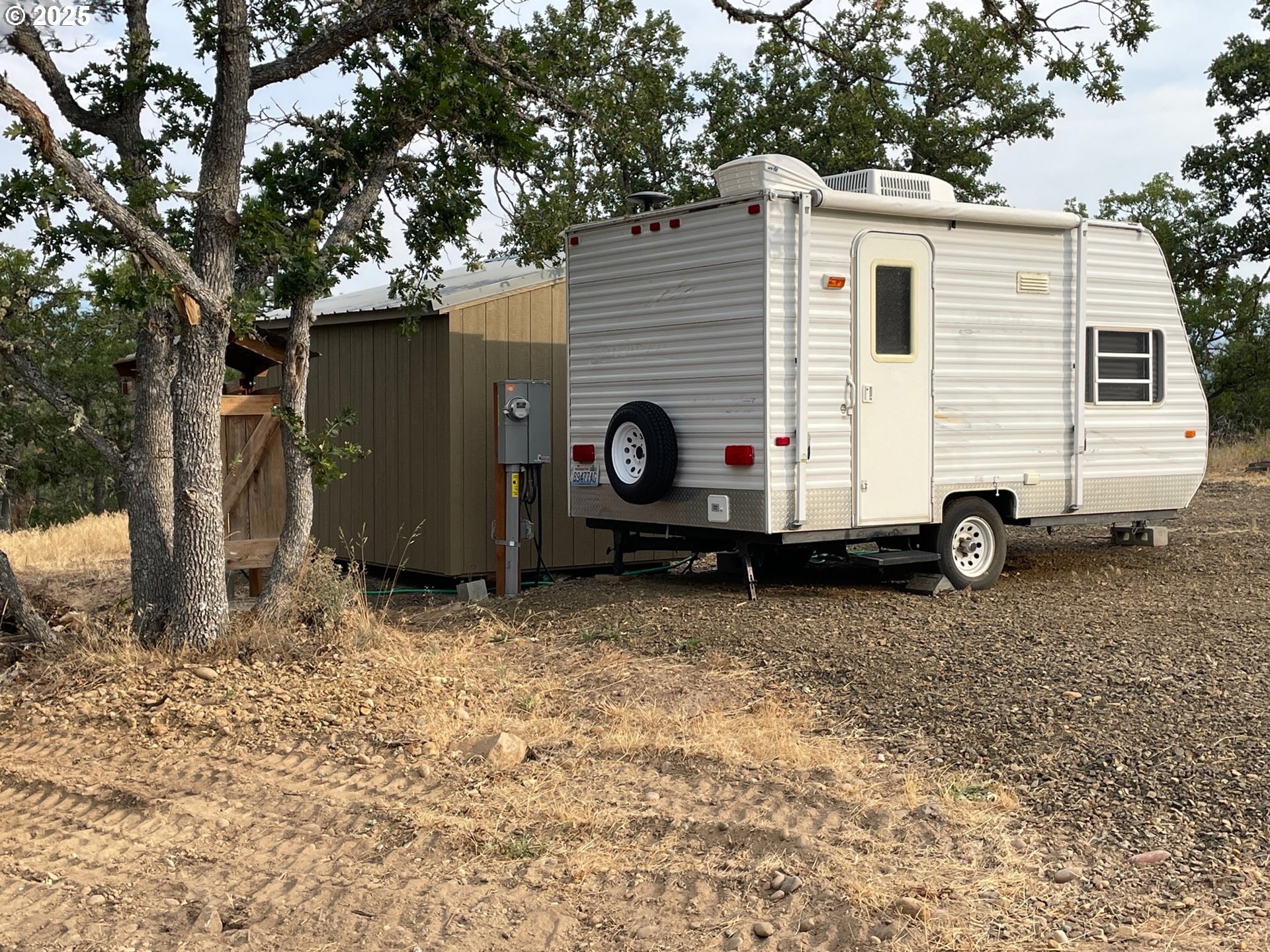 104 Jenkins Creek Road Goldendale, WA 98620 - Photo 19 of 45 a view of a house with a yard