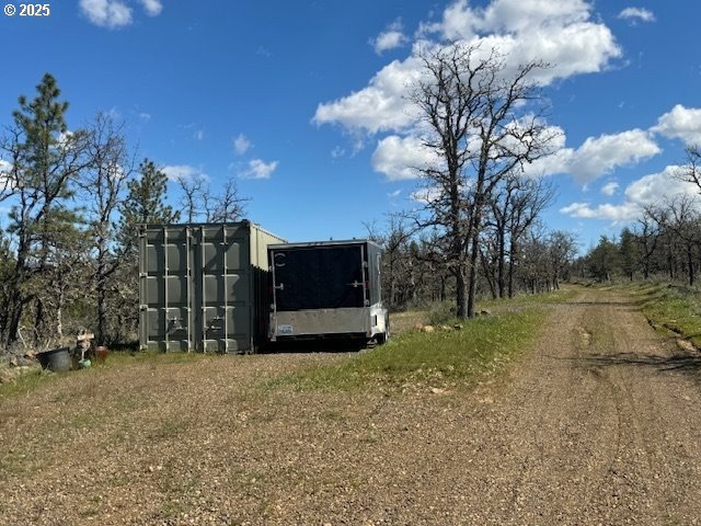104 Jenkins Creek Road Goldendale, WA 98620 - Photo 37 of 45 a view of a yard with wooden fence