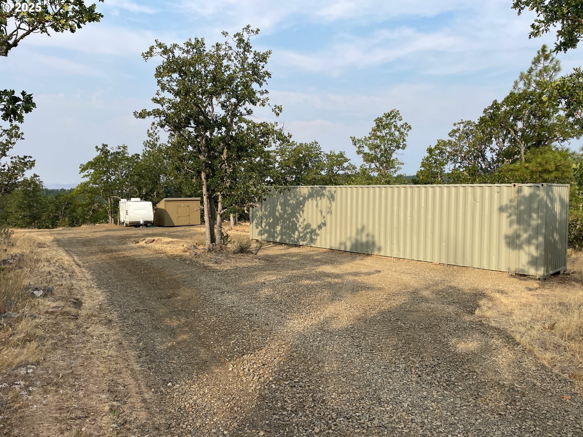 104 Jenkins Creek Road Goldendale, WA 98620 - Photo 6 of 45 a view of backyard and tree