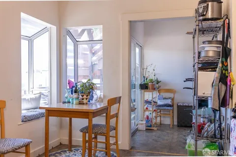 workspace with wooden floor windows and wardrobe