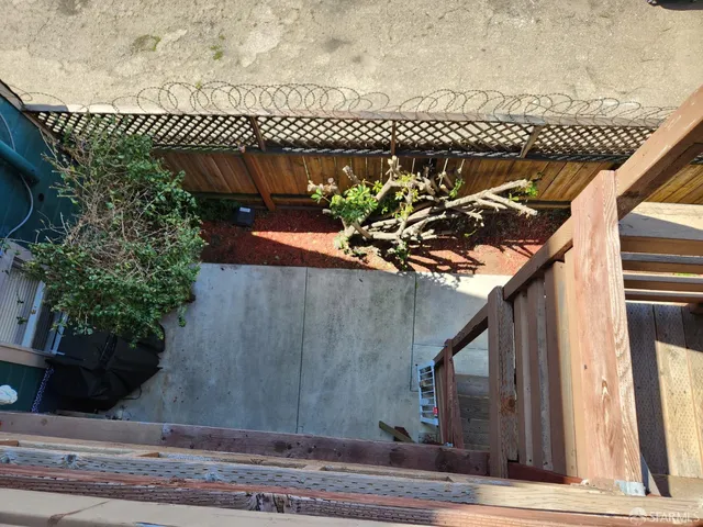 a view of building with parking space