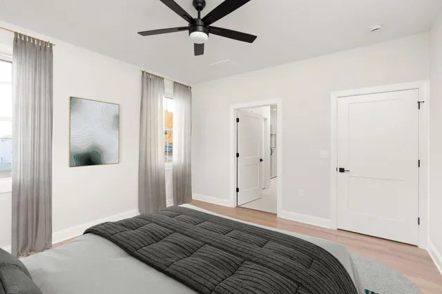 a bedroom with a bed and closet