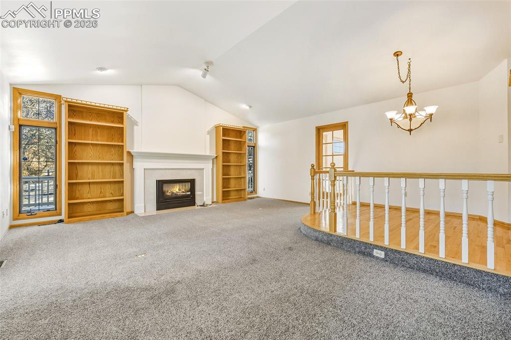435 East Woodmen Road Colorado Springs, CO 80919 - Photo 13 of 50 a view of an empty room with a fireplace