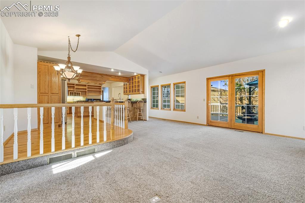 435 East Woodmen Road Colorado Springs, CO 80919 - Photo 15 of 50 a view of livingroom with furniture and chandelier