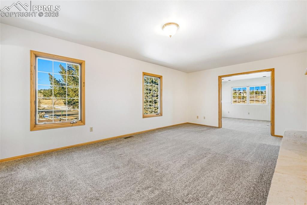 435 East Woodmen Road Colorado Springs, CO 80919 - Photo 27 of 50 an empty room with windows