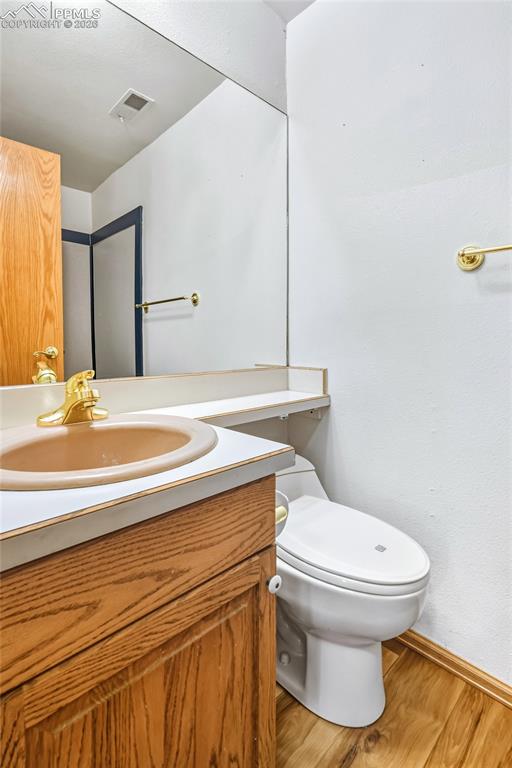 435 East Woodmen Road Colorado Springs, CO 80919 - Photo 28 of 50 a bathroom with a sink and a toilet
