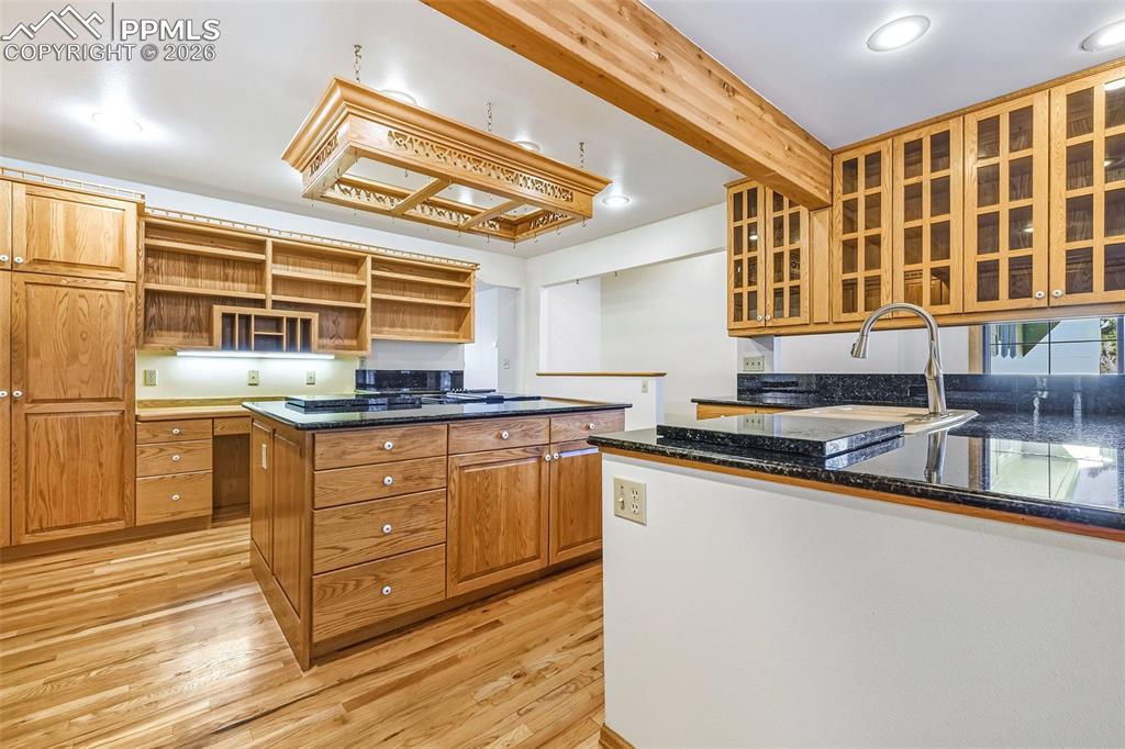 435 East Woodmen Road Colorado Springs, CO 80919 - Photo 3 of 50 a kitchen with stainless steel appliances granite countertop a sink and cabinets
