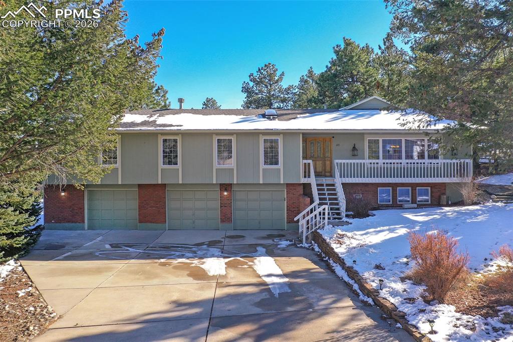 435 East Woodmen Road Colorado Springs, CO 80919 - Photo 42 of 50 a view of a house with wooden floor