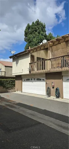 front view of a house with a street