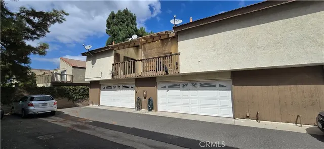 a front view of a house with a garage