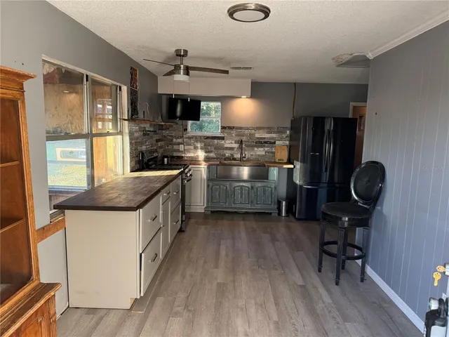 a view of a back yard of the house