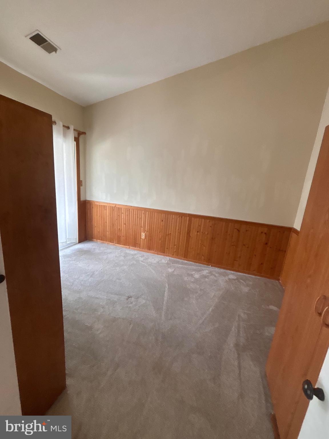 12889 C Grays Pointe Road, Unit 12889C Fairfax, VA 22033 - Photo 5 of 21 an empty room with wooden floor