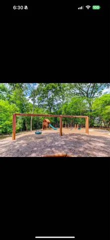 a view of an ocean and a yard