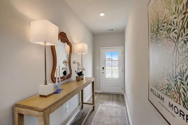 a bathroom with double vanity sink and a mirror