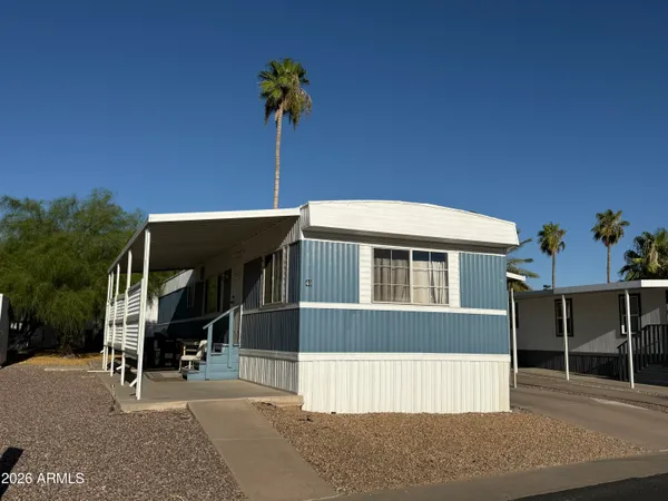 a front view of a house with a garage