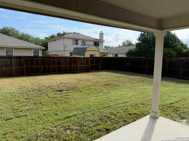 a view of a balcony with chairs