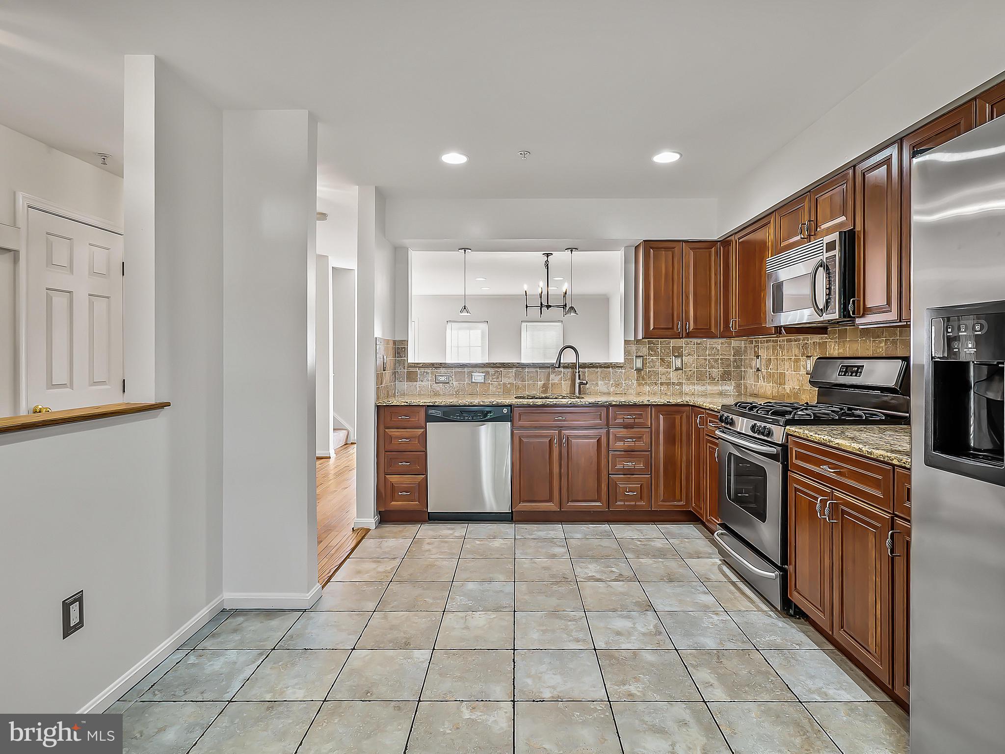 16820 Centerfield Way Olney, MD 20832 - Photo 9 of 48 Kitchen with S.S. Appliances