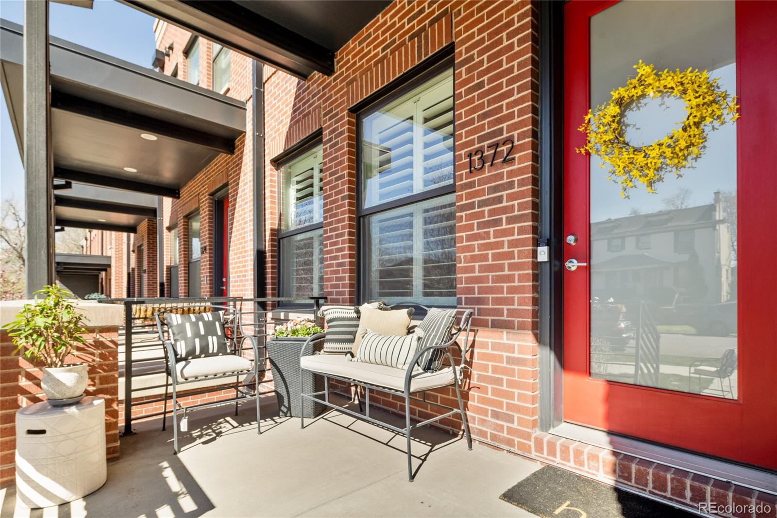 a building outdoor space with patio furniture
