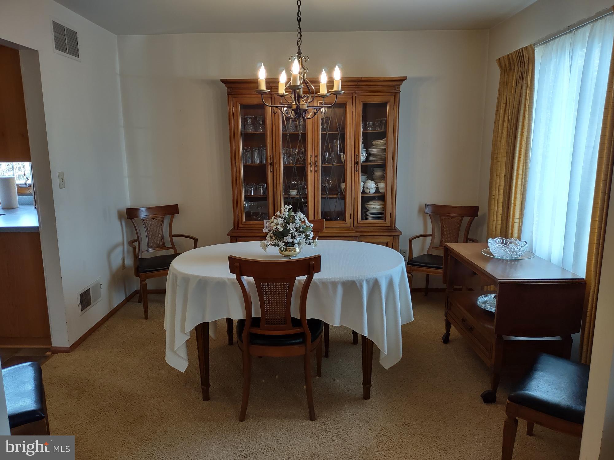 601 Rowe Drive Aberdeen, MD 21001 - Photo 11 of 52 a dining room with furniture and chandelier