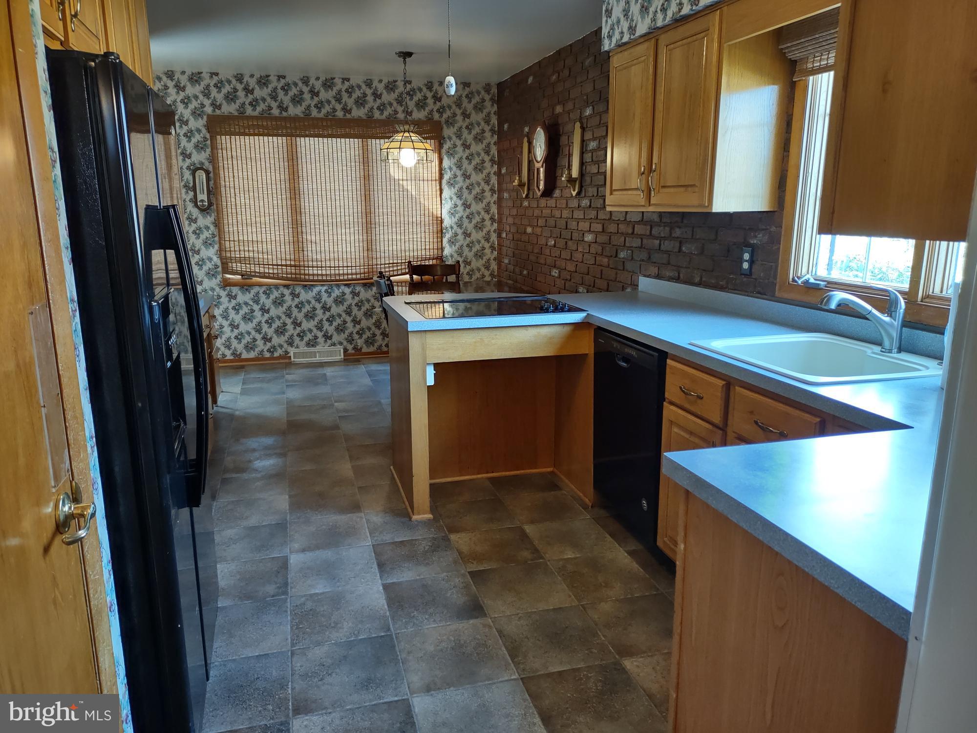 601 Rowe Drive Aberdeen, MD 21001 - Photo 14 of 52 a bathroom with a sink and a mirror
