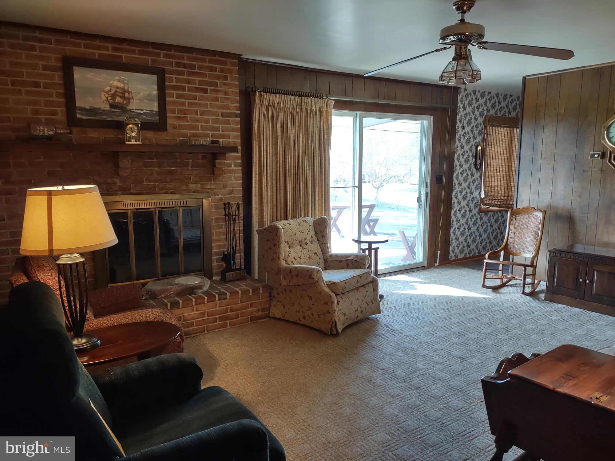 601 Rowe Drive Aberdeen, MD 21001 - Photo 21 of 52 a living room with furniture and a fireplace