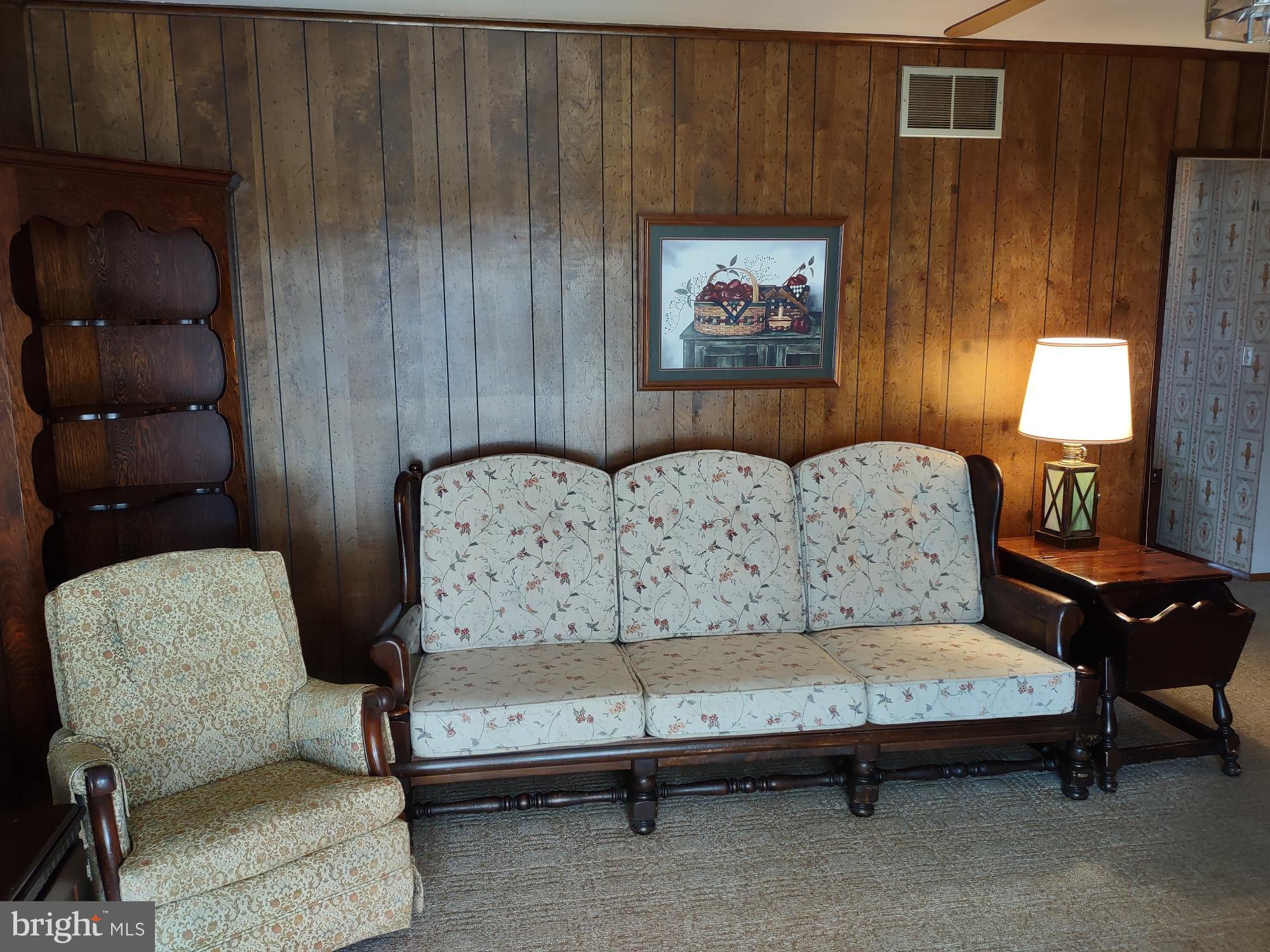 601 Rowe Drive Aberdeen, MD 21001 - Photo 23 of 52 a living room with furniture and a painting