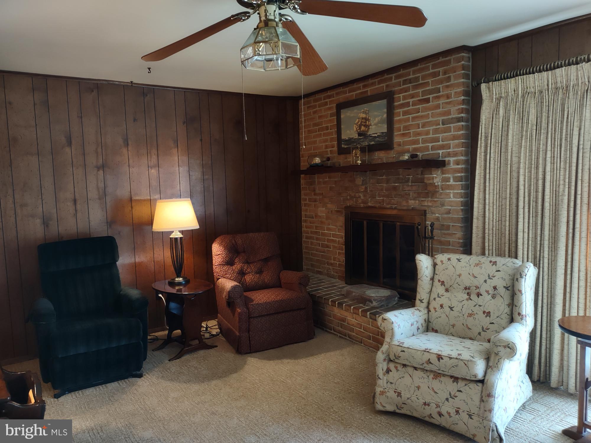 601 Rowe Drive Aberdeen, MD 21001 - Photo 24 of 52 a living room with furniture and a fireplace