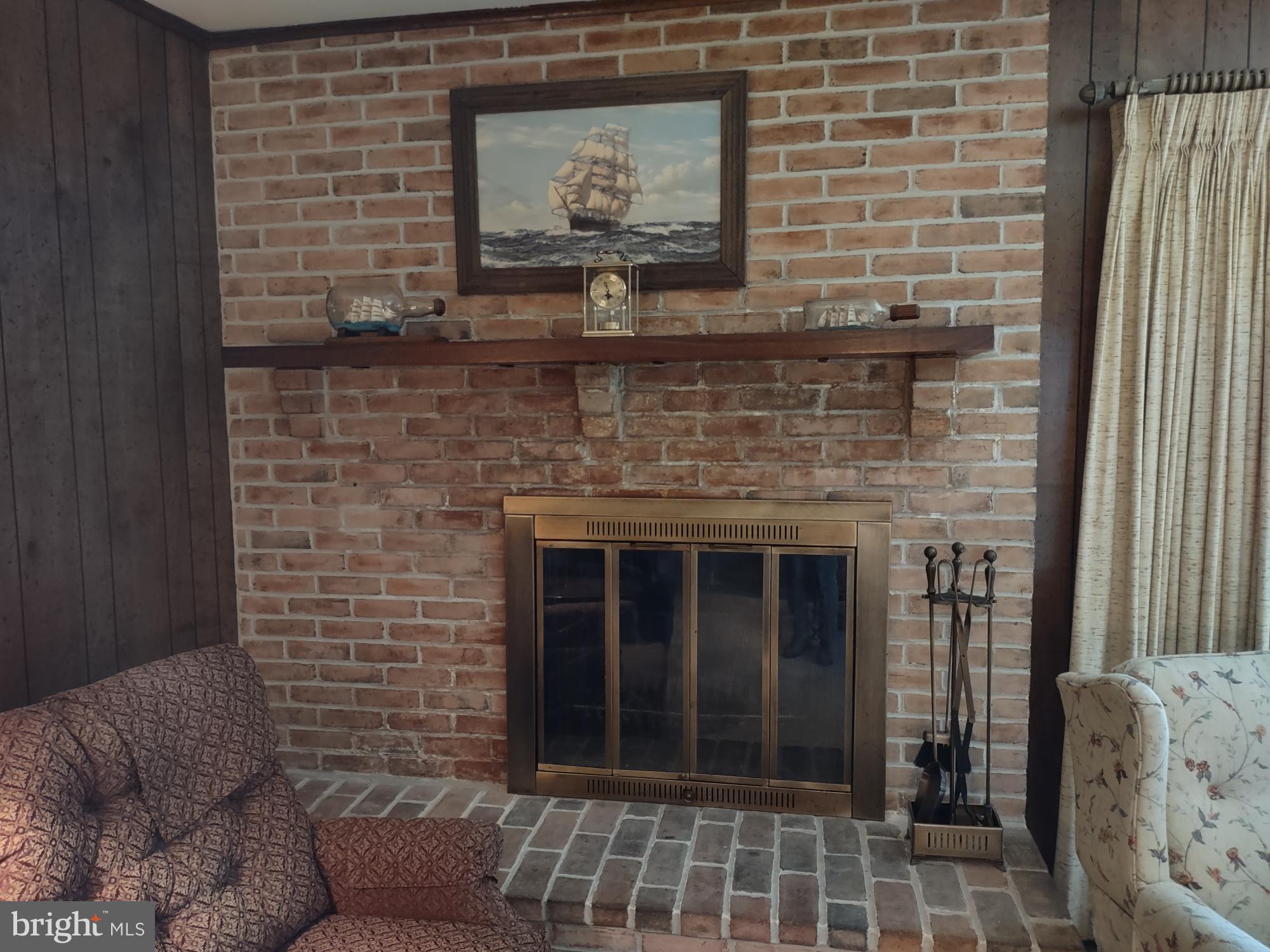 601 Rowe Drive Aberdeen, MD 21001 - Photo 25 of 52 a living room with furniture and a fireplace