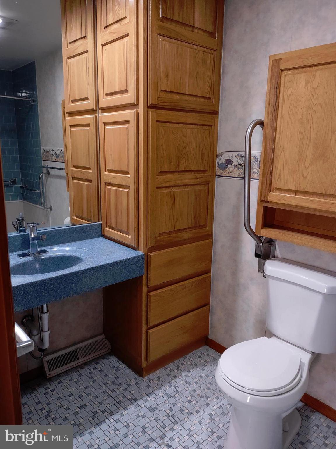 601 Rowe Drive Aberdeen, MD 21001 - Photo 31 of 52 a bathroom with a toilet a sink and tub