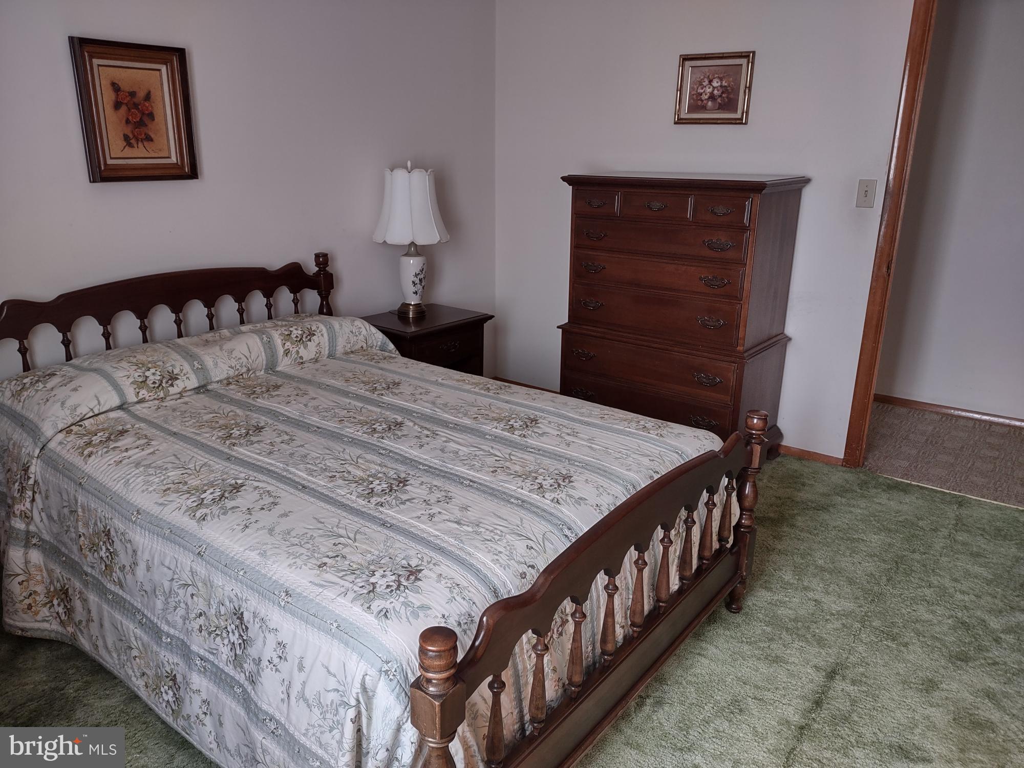 601 Rowe Drive Aberdeen, MD 21001 - Photo 35 of 52 a bedroom with a bed and a dresser