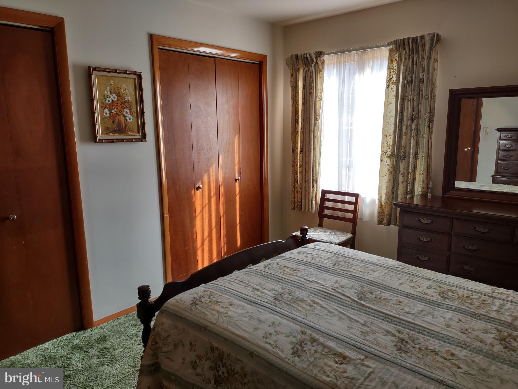 601 Rowe Drive Aberdeen, MD 21001 - Photo 37 of 52 a bedroom with a bed and a dresser