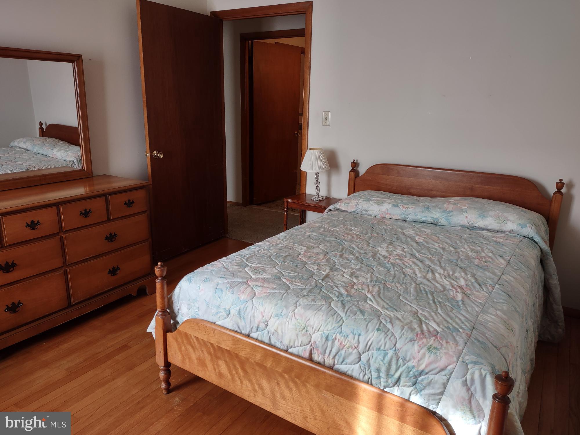 601 Rowe Drive Aberdeen, MD 21001 - Photo 40 of 52 a bedroom with a bed and a dresser in it