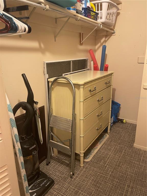 4650 Cove Circle, Unit 402 St. Petersburg, FL 33708 - Photo 31 of 36 a utility room with dryer and washer