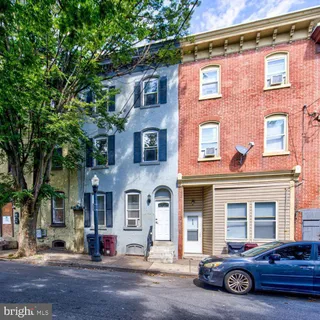 a car parked in front of a building