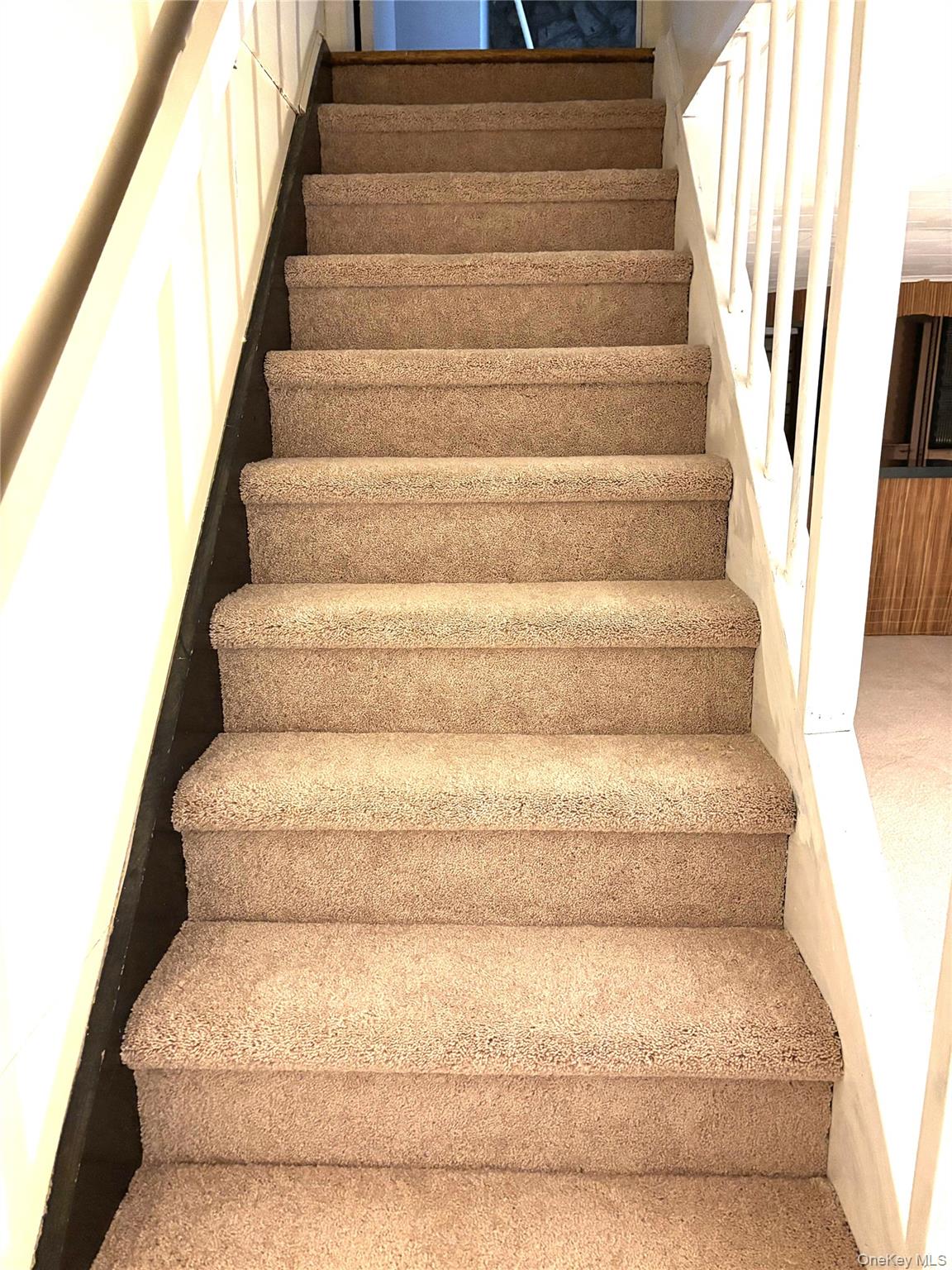 1483 4th Street West Babylon, NY 11704 - Photo 17 of 25 a view of staircase with white walls