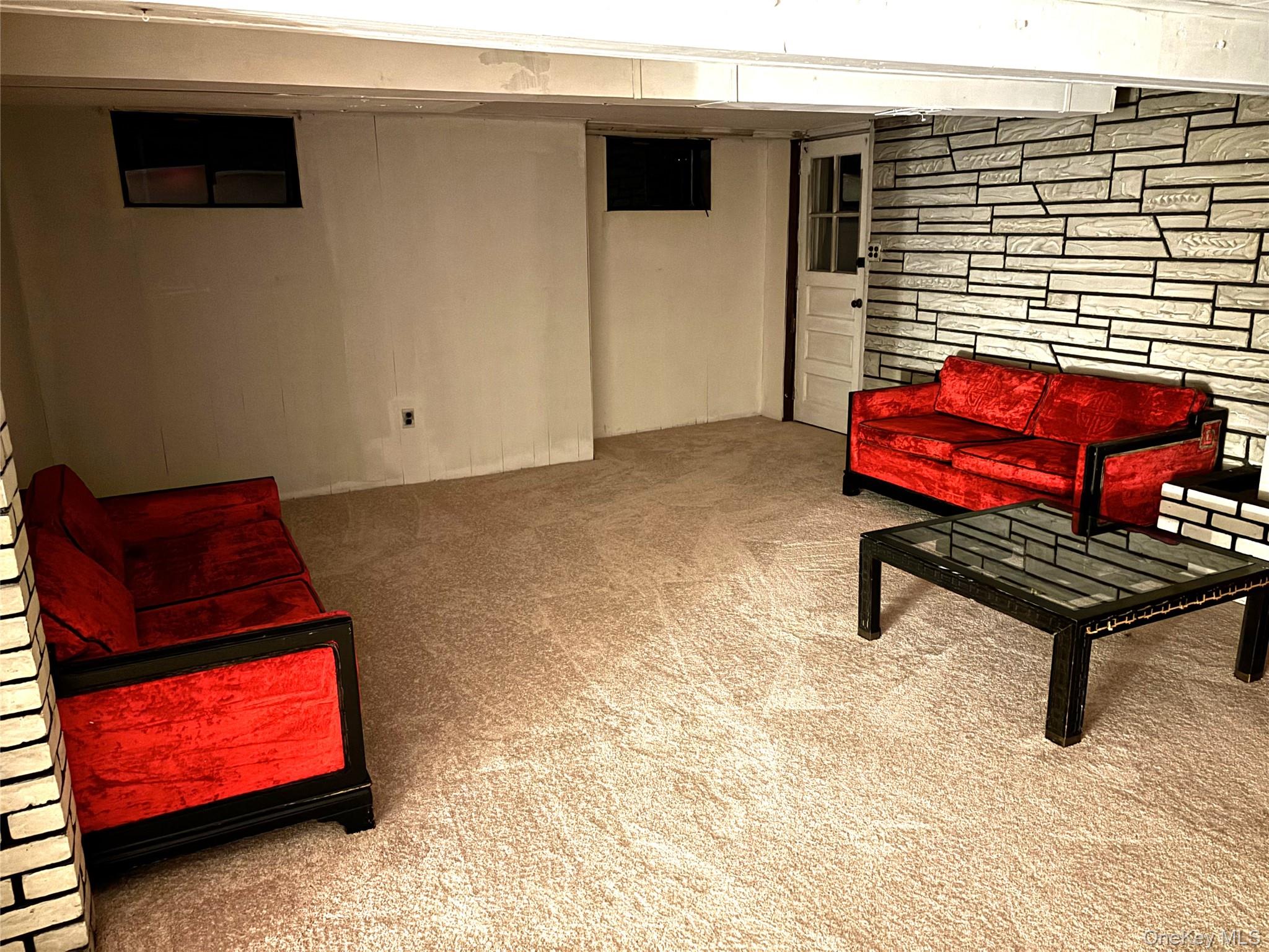 1483 4th Street West Babylon, NY 11704 - Photo 19 of 25 a backyard of a house with barbeque oven table and chairs