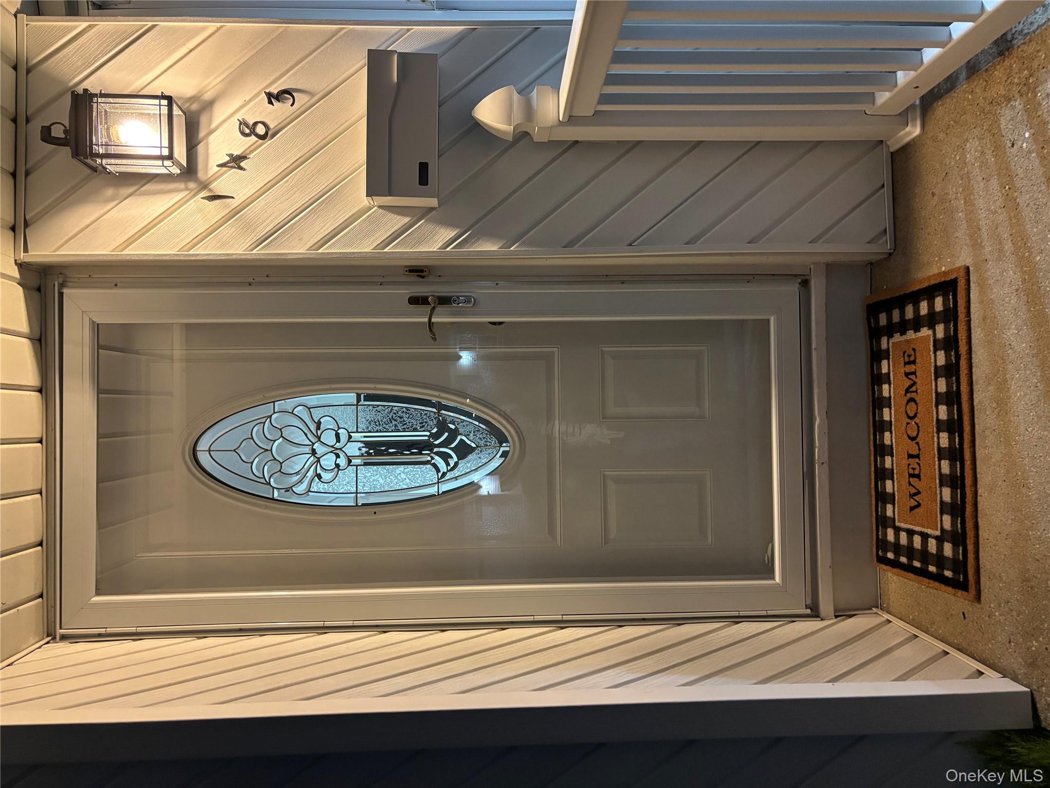 1483 4th Street West Babylon, NY 11704 - Photo 21 of 25 a view of entryway with wooden floor