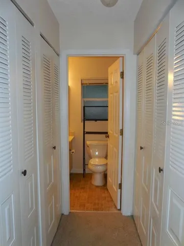 a bathroom that has a toilet in it