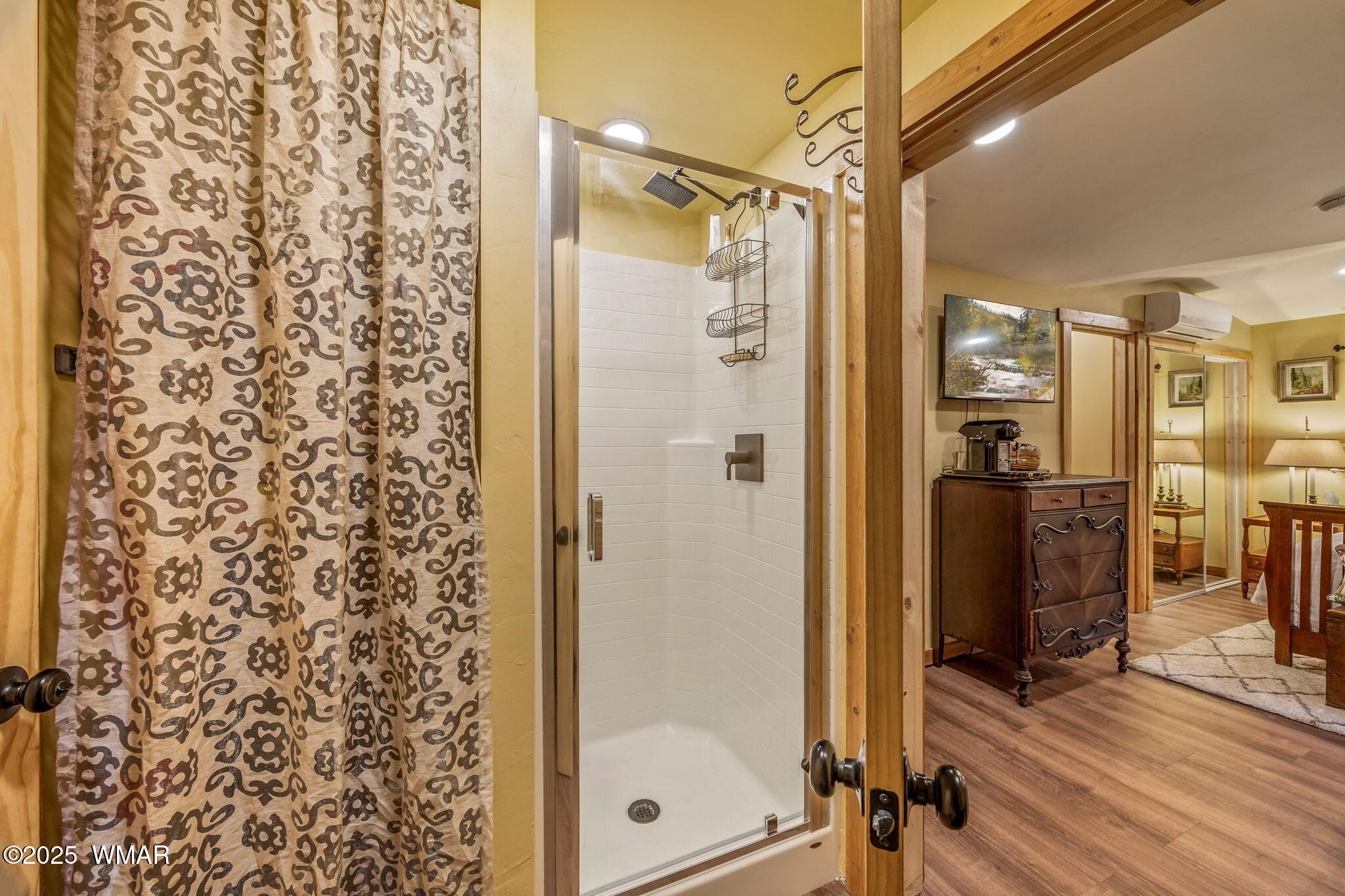 2891 Antelope Trail Overgaard, AZ 85933 - Photo 21 of 41 a bathroom with a shower and a glass door shower