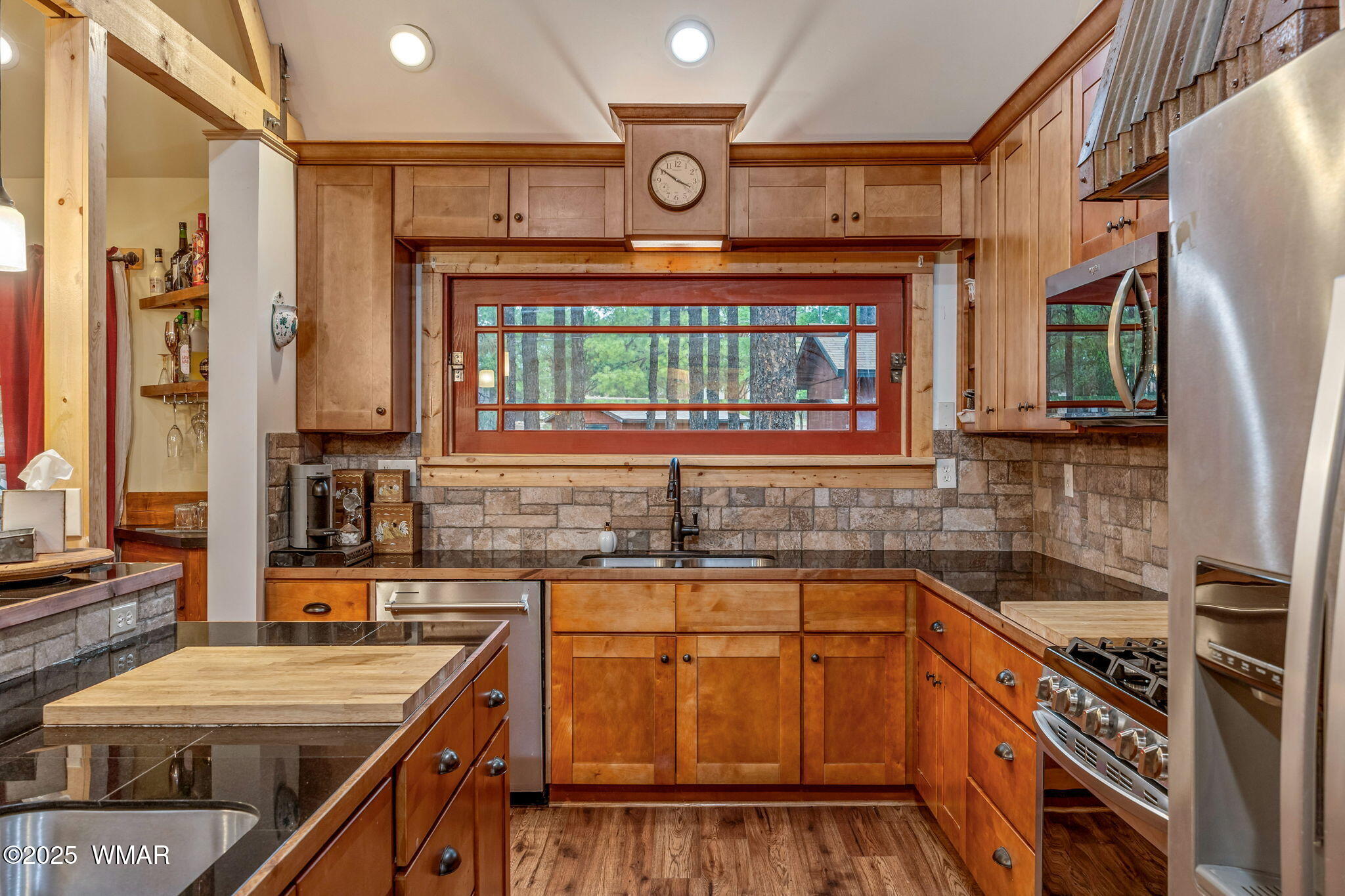 2891 Antelope Trail Overgaard, AZ 85933 - Photo 6 of 41 a kitchen with stainless steel appliances granite countertop a stove and a sink