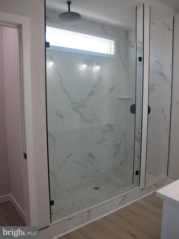 a view of a room with a large window