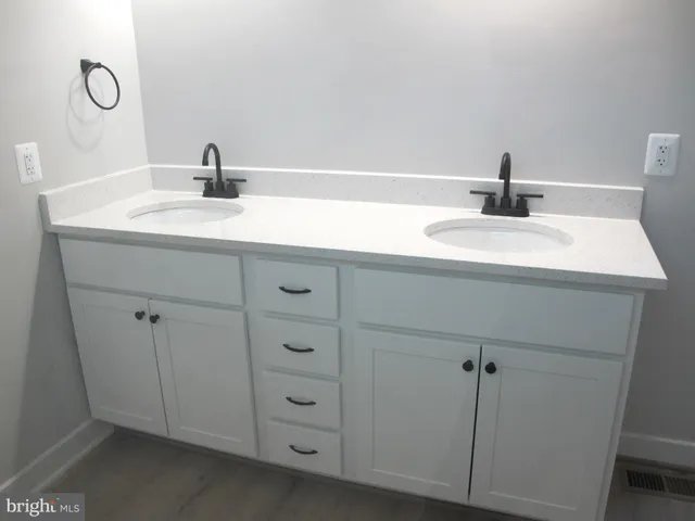 a view of a lake with a building in the background