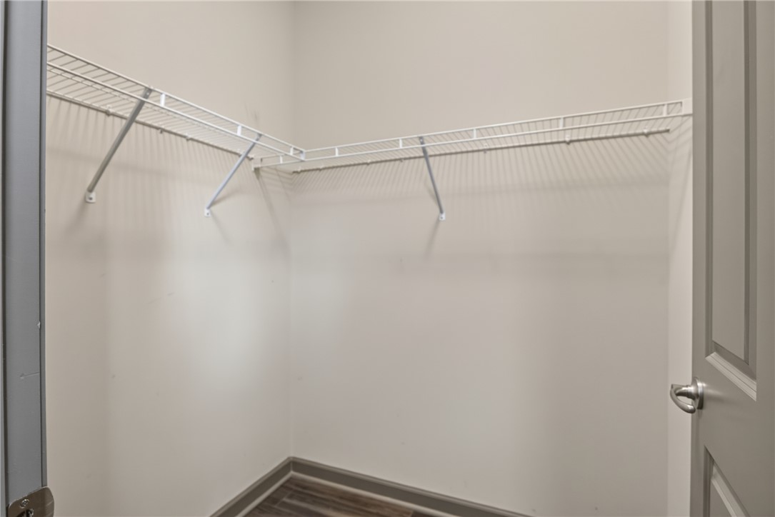 235 Pendleton Road, Unit K1 Clemson, SC 29631 - Photo 25 of 49 Ample closet space awaits, featuring a corner wire shelving system for organized storage solutions.